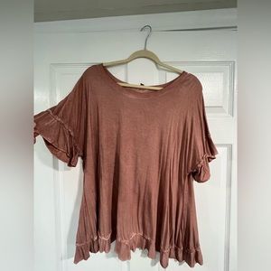 Sandy Pink Boutique top with open back. Size Large